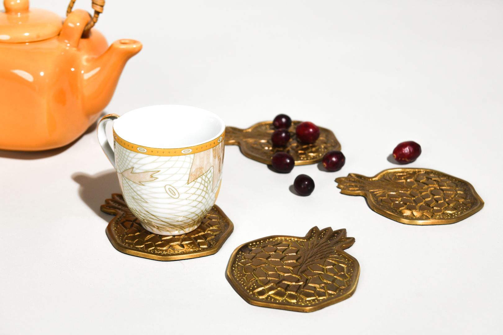 Fruit of Fortune Brass Coasters – Set of Four